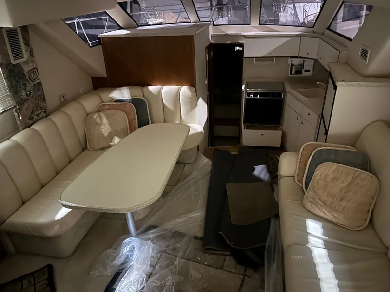Slide: The Image of Interior of a 1998 Silverton 351 Sedan yacht with leather sofas. - 19