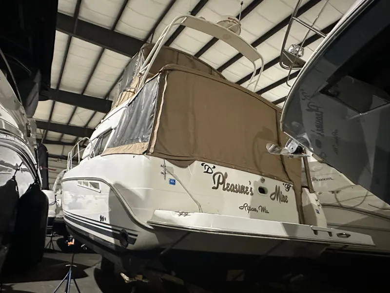 Slide: The Image of 1998 Silverton 351 Sedan in storage facility. - 34