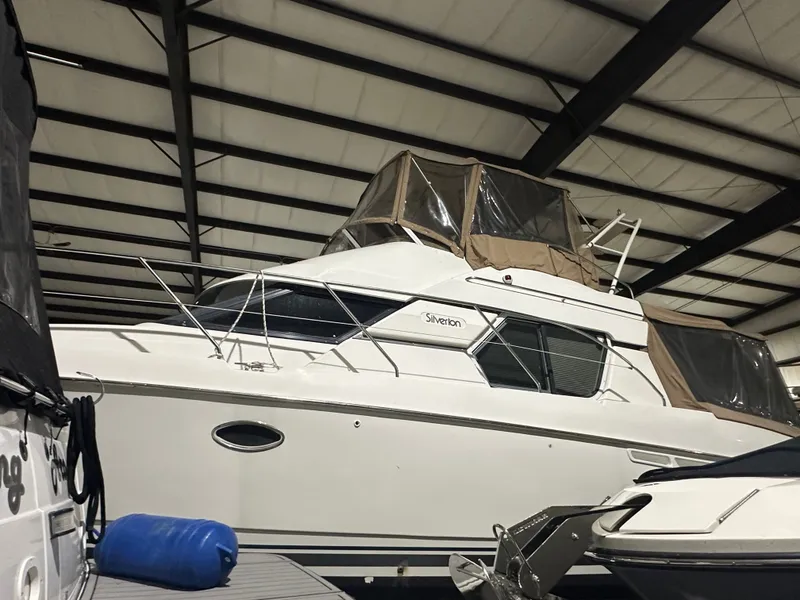 Slide: The Image of 1998 Silverton 351 Sedan Yacht in a storage facility. - 35