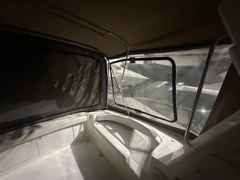 Slide: The Image of Interior of a 1998 Silverton 351 Sedan boat with windows. - 4