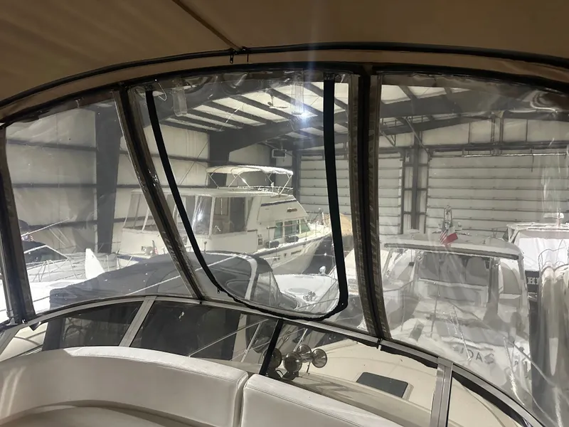 Slide: The Image of Interior view of a 1998 Silverton 351 Sedan in a boat storage facility. - 7
