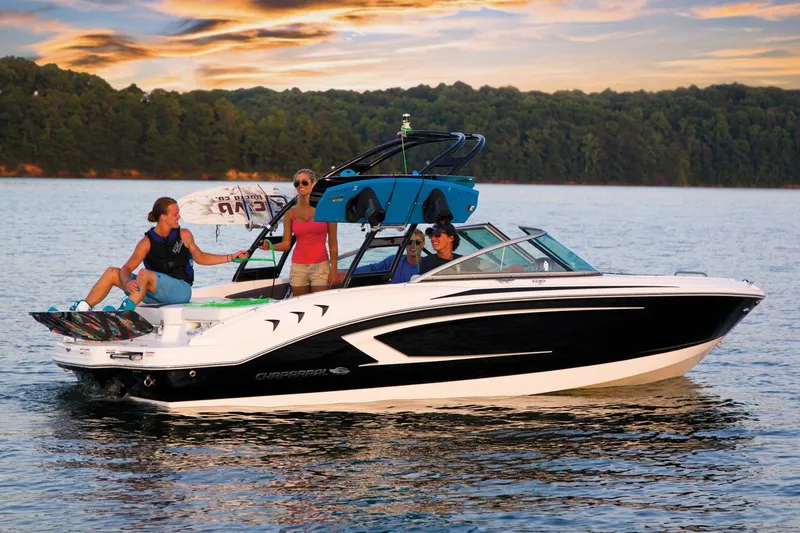 Slide: The Image of Manufacturer Provided Image: 2016 Chaparral 21 H2O Sport boat on a lake with people enjoying water activities. - 17