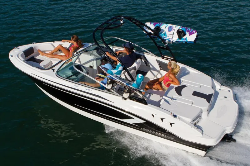 Slide: The Image of Manufacturer Provided Image: 2016 Chaparral 21 H2O Sport boat cruising with passengers on a sunny day. - 22