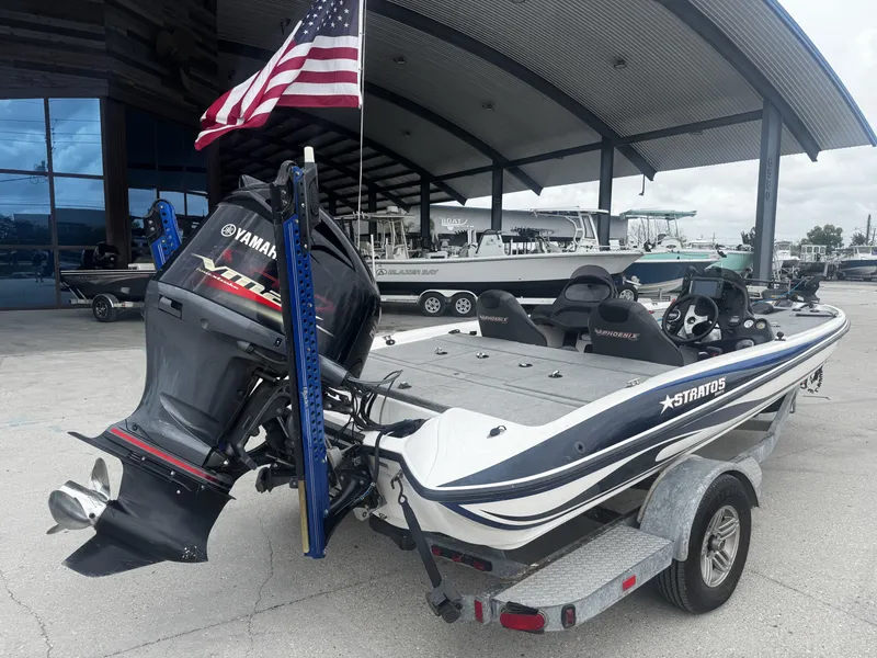 Slide: The Image of 2006 Stratos 285 Pro XL boat with Yamaha engine, American flag. - 6