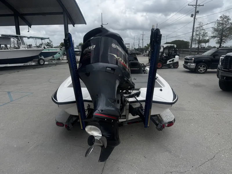Slide: The Image of Rear view of a 2006 Stratos 285 Pro XL with Yamaha outboard motor. - 7