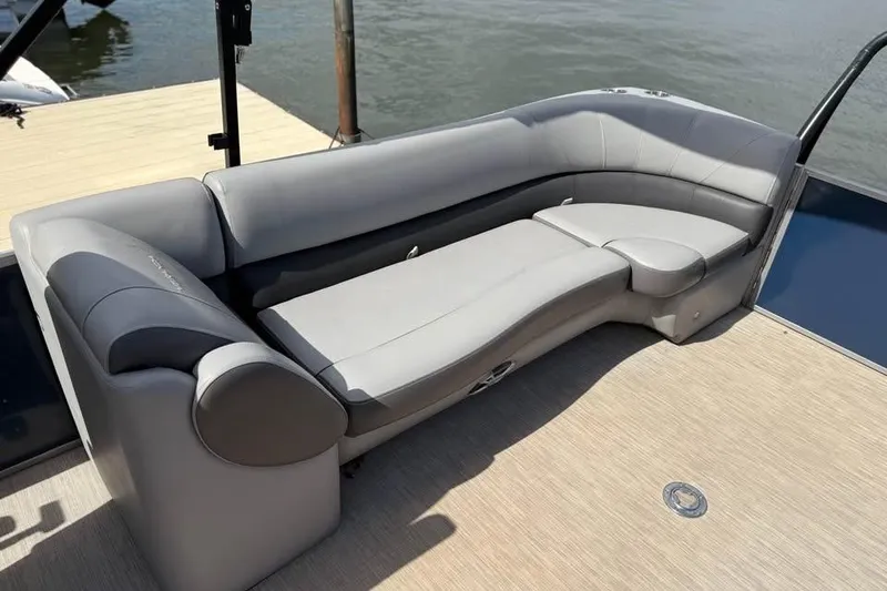 Slide: The Image of 2018 Veranda VR25RC boat with luxurious gray seating on deck. - 10