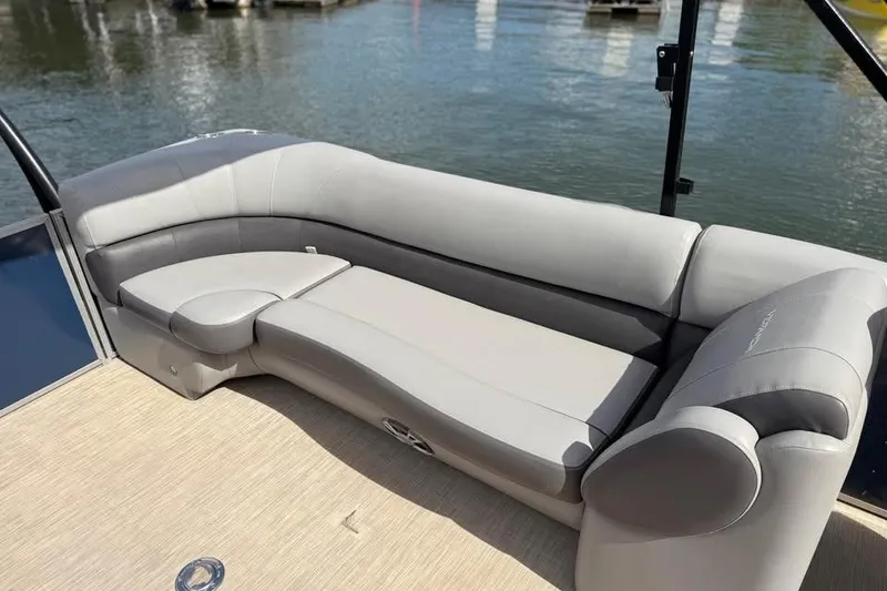 Slide: The Image of Luxurious seating on 2018 Veranda VR25RC boat, overlooking calm waters. - 11
