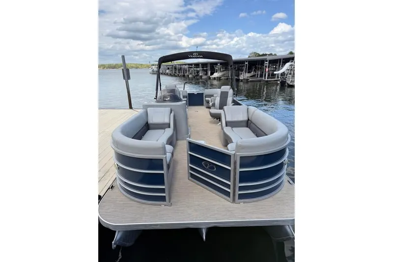 Slide: The Image of 2018 Veranda VR25RC pontoon boat docked on a sunny day. - 6