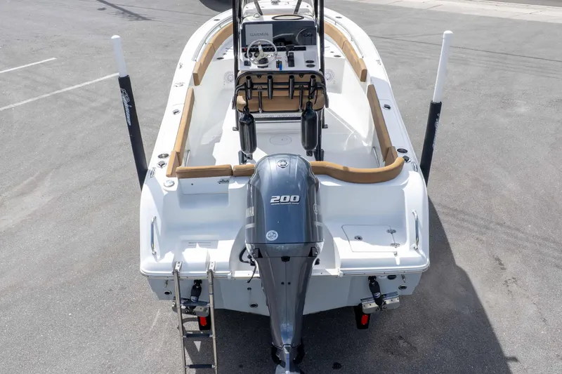 Slide: The Image of 2023 Sea Hunt Ultra 229 boat with Yamaha 200 engine, viewed from the rear. - 43