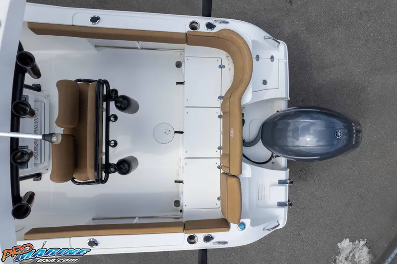Slide: The Image of Overhead view of 2023 Sea Hunt Ultra 229 boat interior with seating and motor. - 46