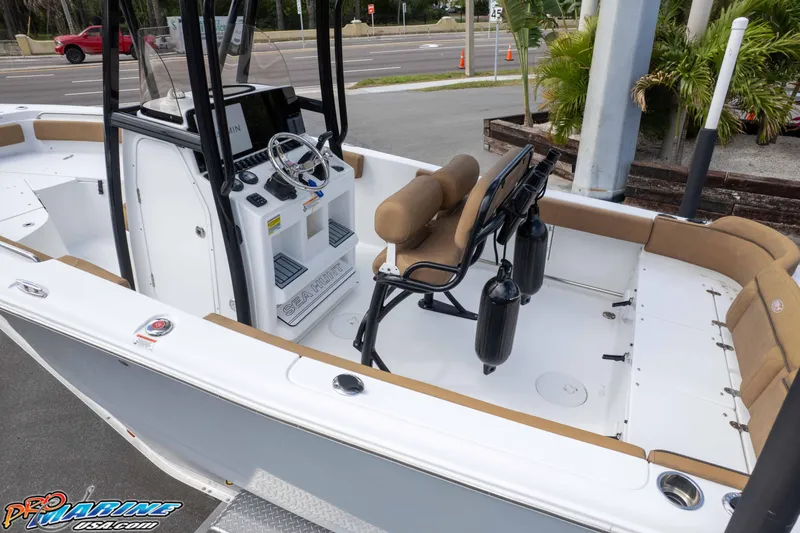 Slide: The Image of 2023 Sea Hunt Ultra 229 boat interior with helm, seating, and console. - 48