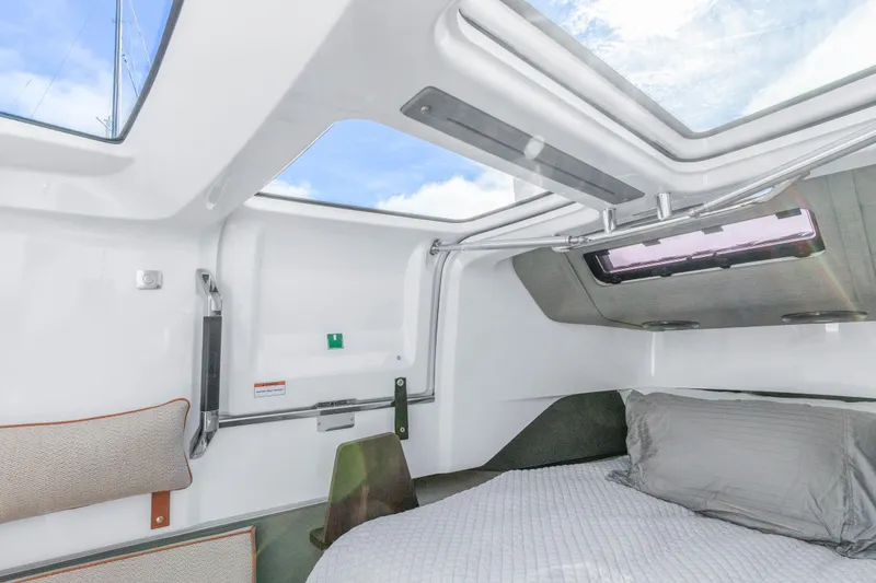 Slide: The Image of Interior cabin of 2021 Axopar 37 XC Cross Cabin with skylight and bed. - 19