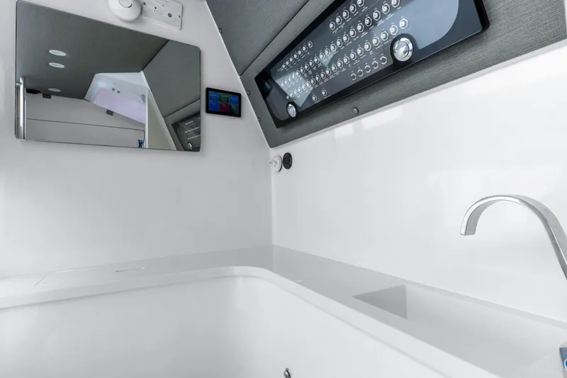 Slide: The Image of Modern bathroom interior of 2021 Axopar 37 XC Cross Cabin boat. - 29