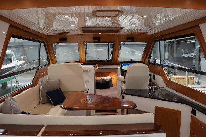 Slide: The Image of Luxurious interior of 2024 True North 34 yacht with elegant wood finishes and modern amenities. - 30