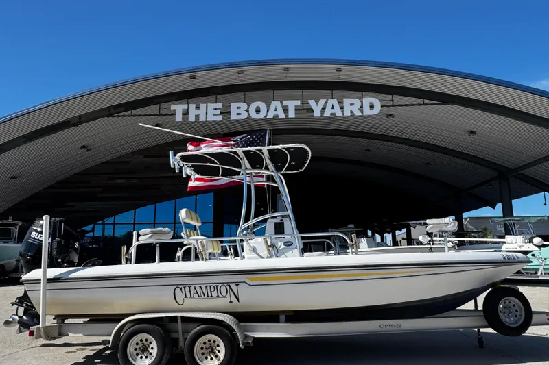 The Image of 2006 Champion 24 Bay Champ boat on trailer at The Boat Yard. - 1