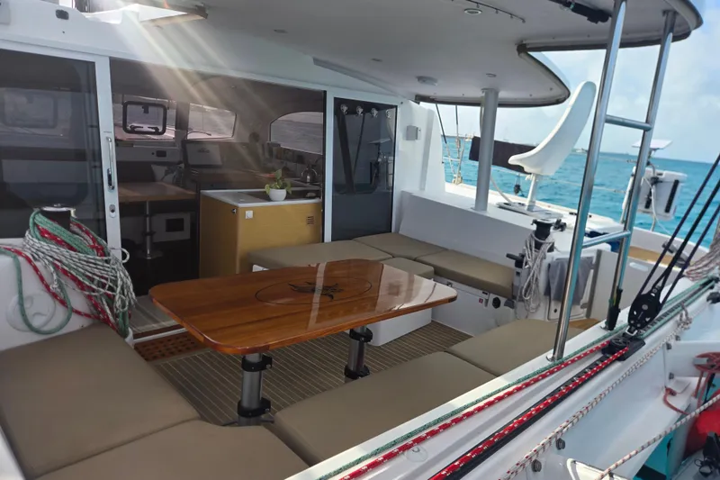 Slide: The Image of Spacious 2016 Outremer 45 catamaran interior with seating and ocean view. - 24