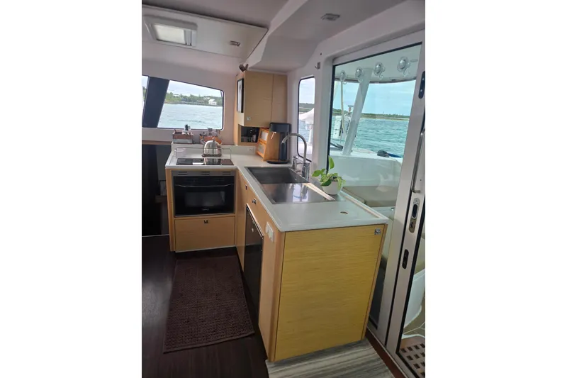 Slide: The Image of Modern kitchen interior of 2016 Outremer 45 catamaran with ocean view. - 34