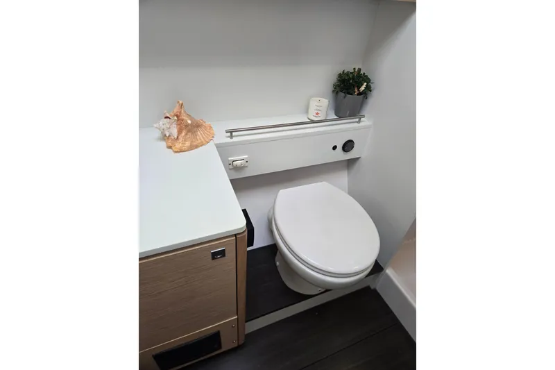 Slide: The Image of Modern bathroom in 2016 Outremer 45 yacht with toilet and decor. - 41