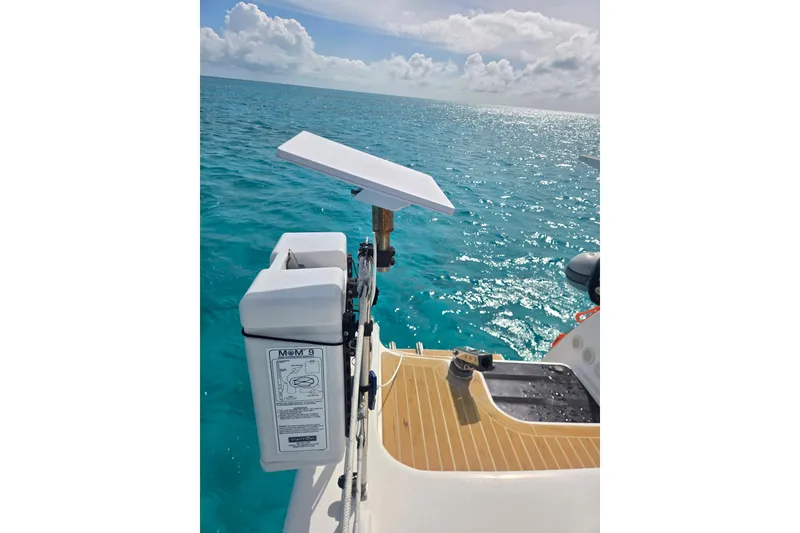 Slide: The Image of Outremer 45 catamaran deck overlooking turquoise ocean, 2016 model. - 45