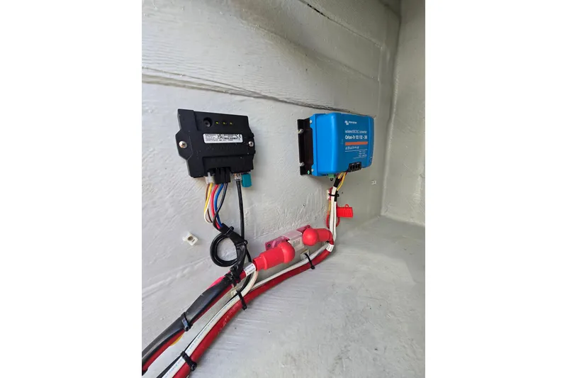 Slide: The Image of Electrical components and wiring inside a 2016 Outremer 45 boat. - 50