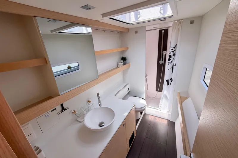 Slide: The Image of Modern bathroom interior of 2016 Outremer 45 yacht with shower, sink, and toilet. - 63