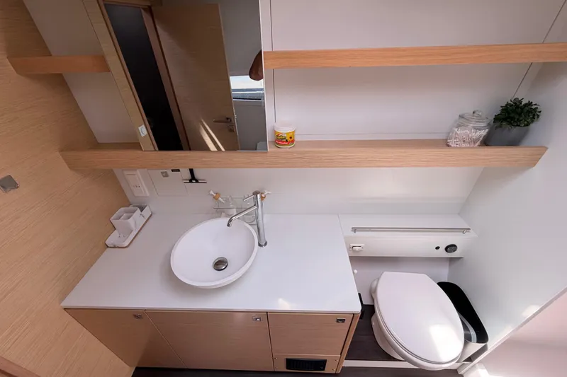 Slide: The Image of Modern bathroom interior of 2016 Outremer 45 yacht with sleek sink and toilet design. - 64