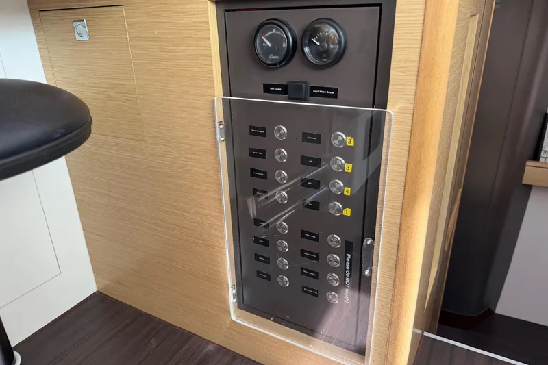 Slide: The Image of Electrical panel on a 2016 Outremer 45 yacht, featuring gauges and switches. - 68