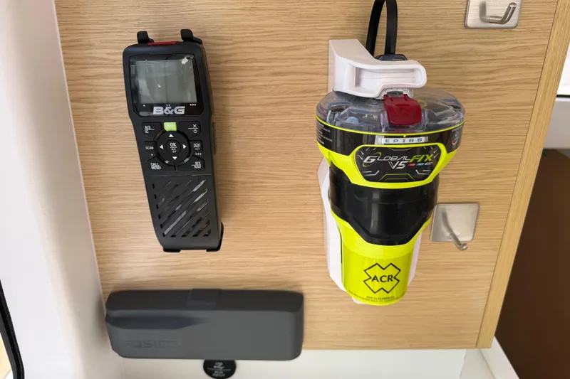 Slide: The Image of Navigation equipment on 2016 Outremer 45 yacht, featuring B&G radio and ACR GlobalFix V5 EPIRB. - 82