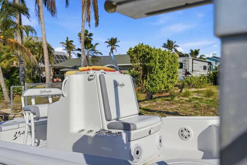 Slide: The Image of Electrical system inside a 2013 Yellowfin 24 Bay boat, featuring batteries and wiring. - 10