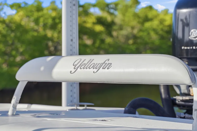 Slide: The Image of Yellowfin 24 Bay 2013 boat logo on deck, featuring elegant script design. - 21