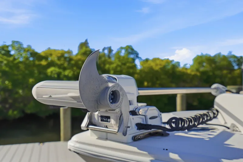 Slide: The Image of Control panel of a 2013 Yellowfin 24 Bay boat with navigation display. - 26