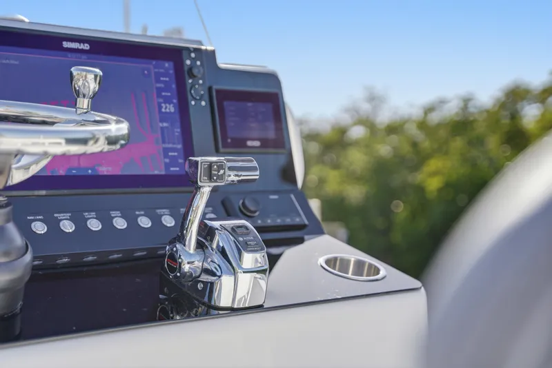 Slide: The Image of Trailer for 2013 Yellowfin 24 Bay boat on sandy ground. - 27