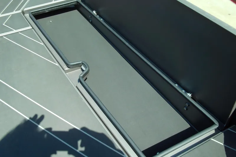 Slide: The Image of Storage compartment on 2026 Stabicraft 2050 Frontier boat deck, featuring sleek design and durable materials. - 11