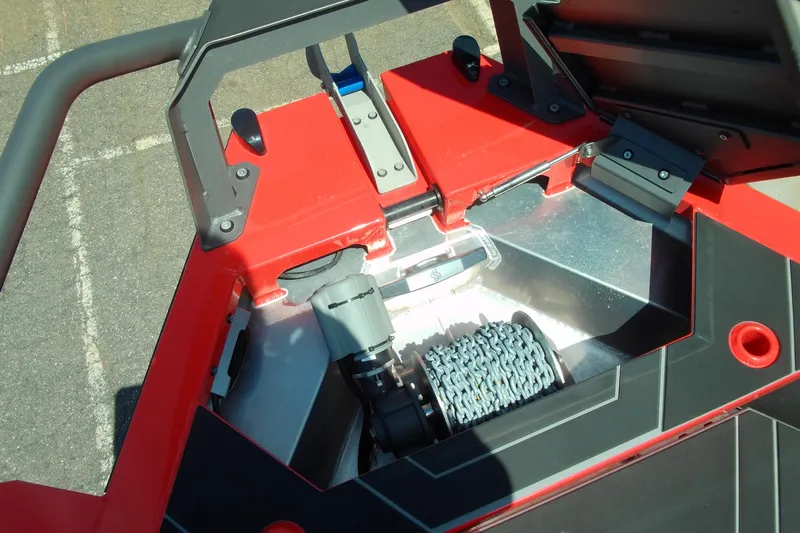 Slide: The Image of Anchor chain compartment of 2026 Stabicraft 2050 Frontier boat, featuring red and black design. - 13