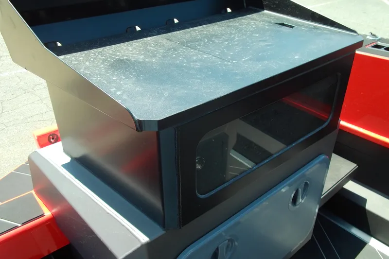 Slide: The Image of Stabicraft 2050 Frontier 2026 console detail with storage compartment and window. - 24