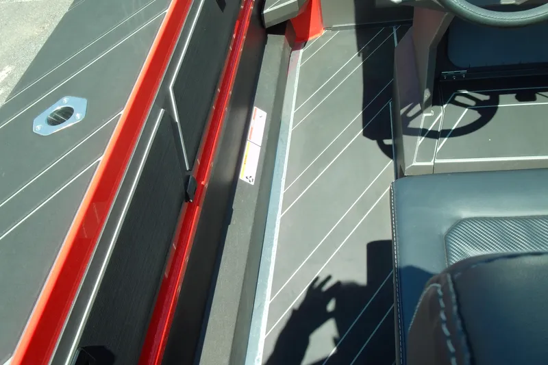 Slide: The Image of Interior view of 2026 Stabicraft 2050 Frontier boat, featuring sleek design and modern seating. - 26