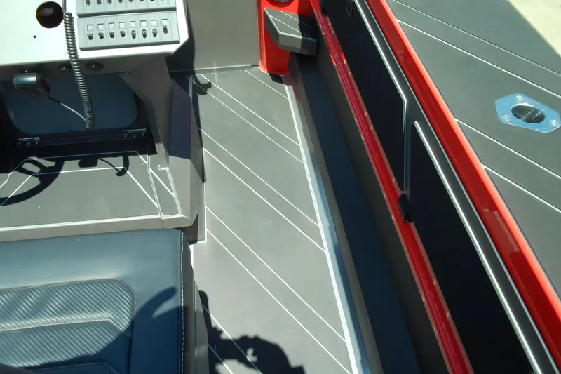 Slide: The Image of Interior view of 2026 Stabicraft 2050 Frontier boat, featuring sleek design and modern controls. - 27