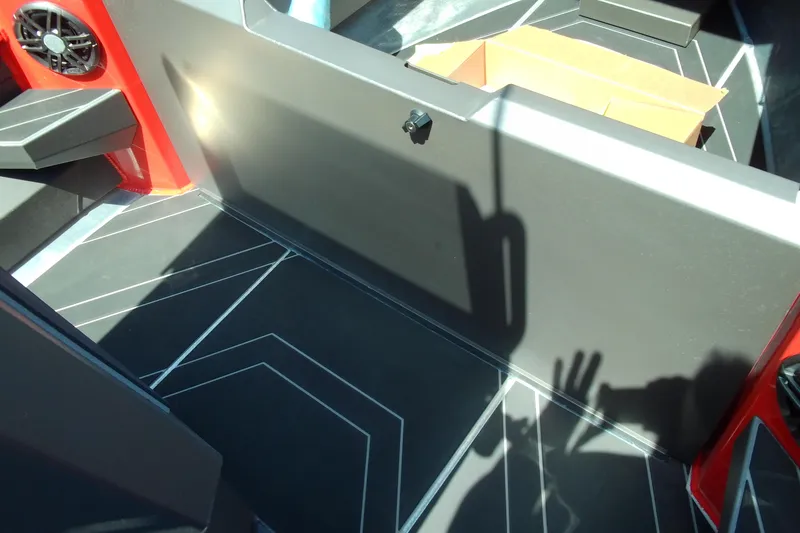 Slide: The Image of Interior of 2026 Stabicraft 2050 Frontier boat with geometric flooring design. - 9