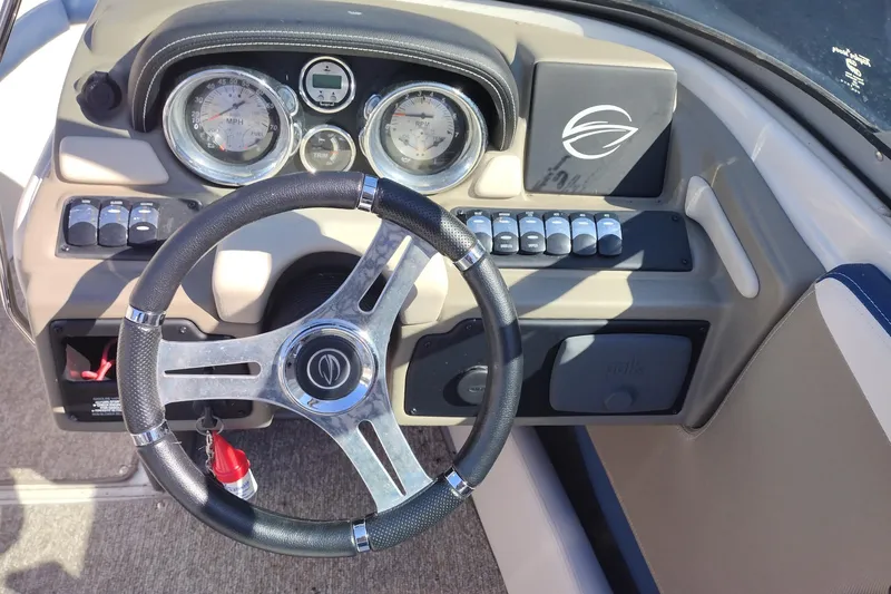 Slide: The Image of Steering wheel and dashboard of 2017 Crownline 225 SS boat. - 10