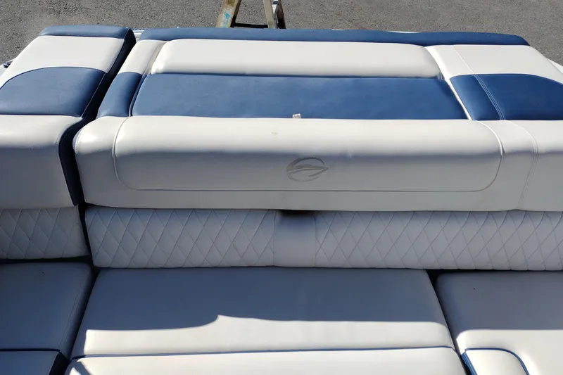 Slide: The Image of 2017 Crownline 225 SS boat seating with blue and white upholstery. - 24