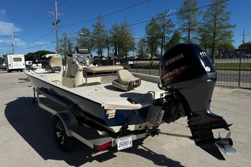 The Image of 2017 Xpress H20B Bay boat with Yamaha engine, parked outdoors. - 2