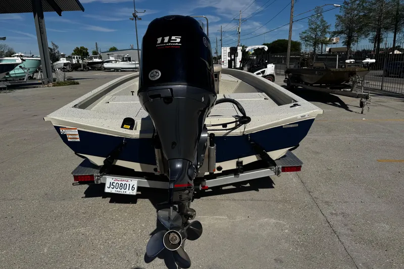 Slide: The Image of 2017 Xpress H20B Bay boat with 115 horsepower outboard motor on trailer. - 5