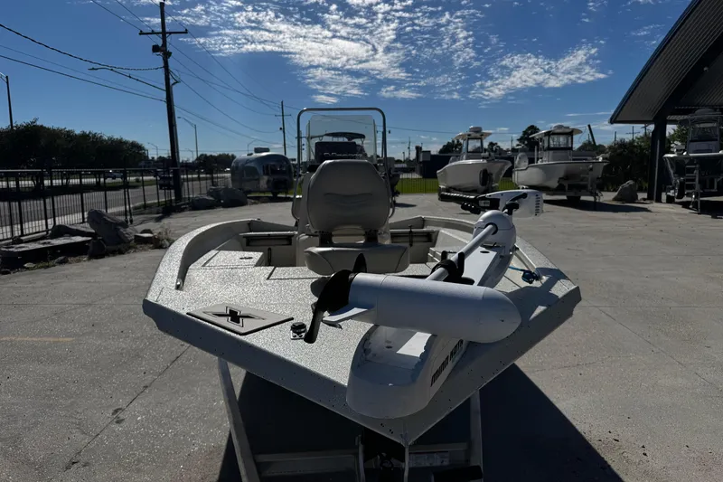 Slide: The Image of 2017 Xpress H20B Bay boat on display under a clear blue sky. - 8