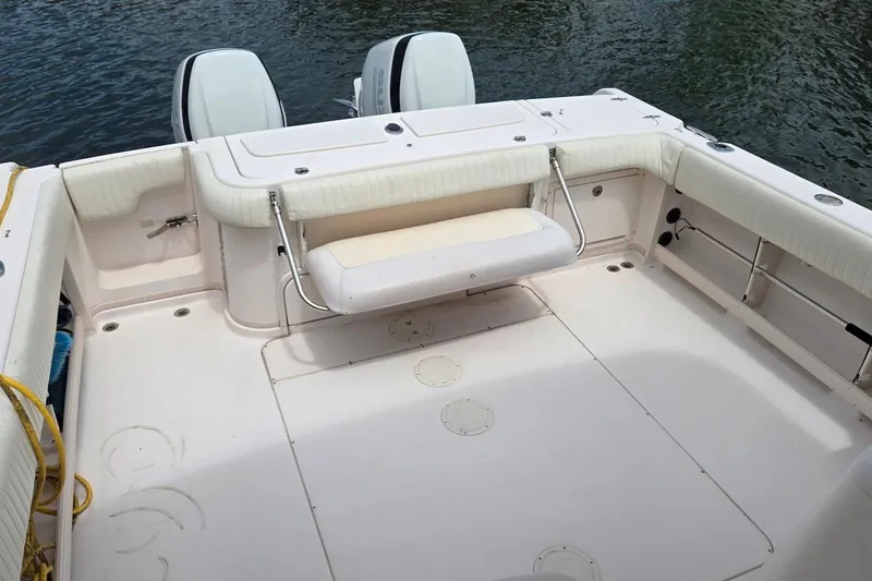 Slide: The Image of 2006 Grady-White Express 330 boat deck with seating, overlooking water. - 9