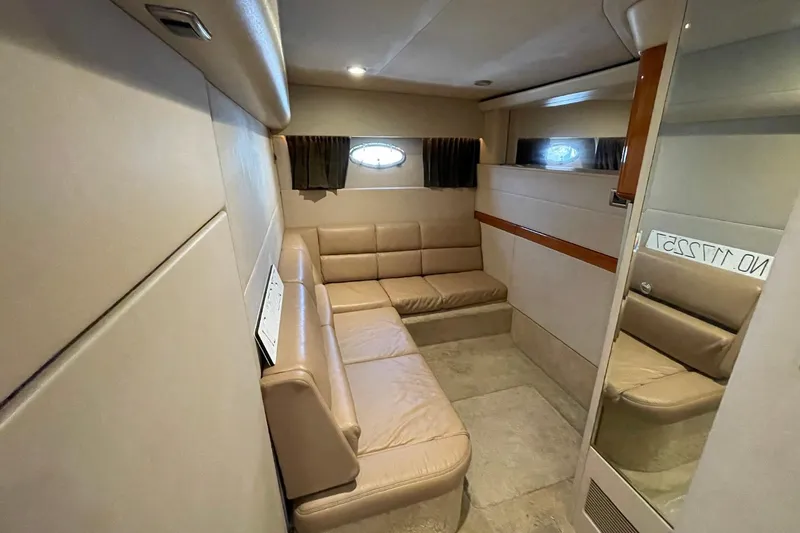 Slide: The Image of Interior of 2005 Formula 48 Yacht with beige leather seating and modern design. - 16