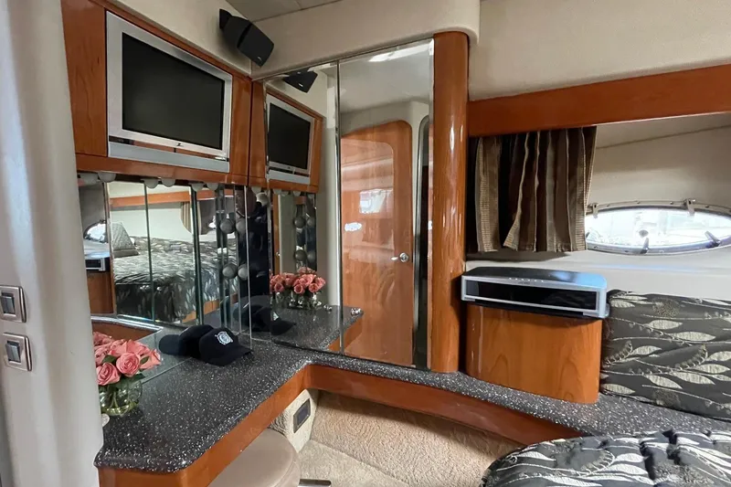 Slide: The Image of Luxurious interior of a 2005 Formula 48 Yacht with elegant wood finishes and modern amenities. - 17