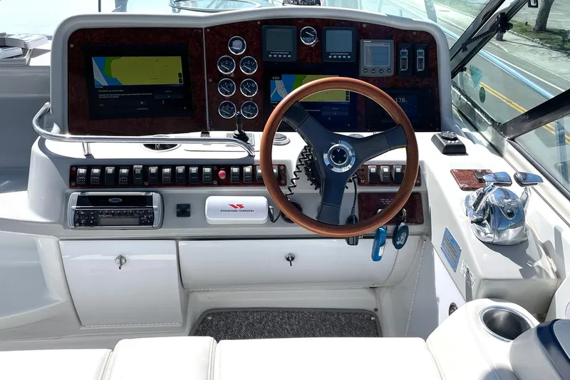 Slide: The Image of Cockpit of 2005 Formula 48 Yacht with steering wheel and navigation instruments. - 3