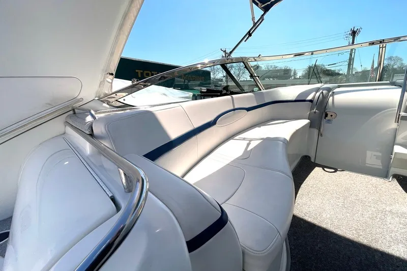 Slide: The Image of Luxurious interior of a 2005 Formula 48 Yacht with white seating and chrome accents. - 7
