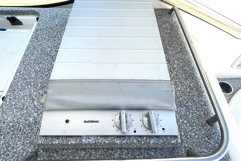 Slide: The Image of Gaggenau grill on 2005 Formula 48 Yacht, featuring granite countertop and control knobs. - 9