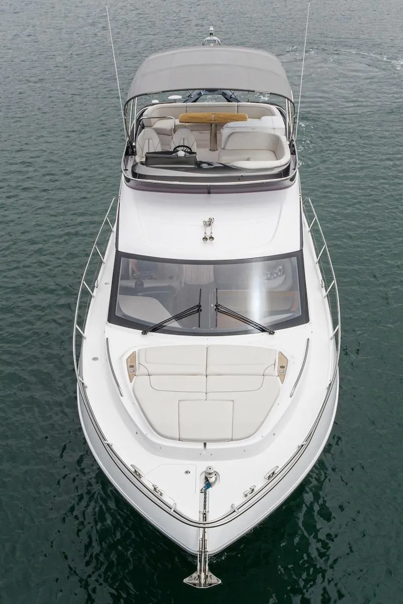 Slide: The Image of 2024 Princess F45 luxury yacht on open water, top view. - 12